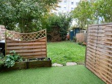 Gartenansicht Sommer Wundersch�ne Wohnung im EG mit gro�em Garten & TG-Stellplatz