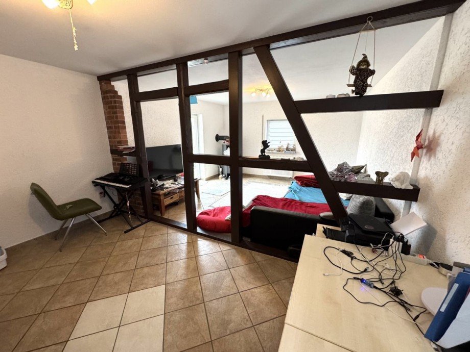 OG Wohnzimmer Mehrfamilienhaus Taunusstein - Wehen